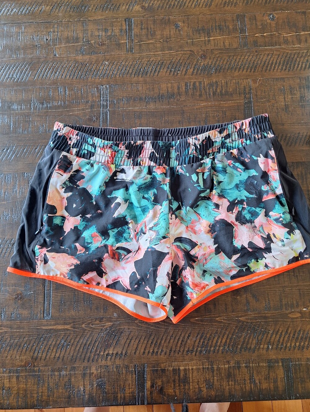 Women’s Fabletics Lined Athletic Shorts in Black and Teal with Orange Trim
